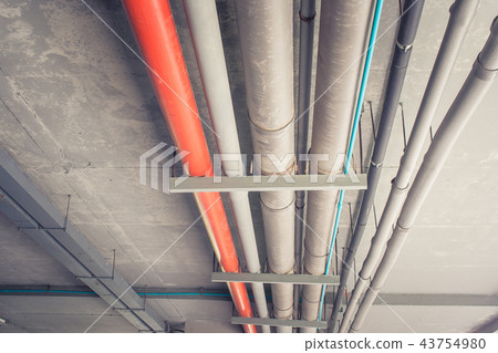 Metal pipeline system install on concrete building Metal pipeline system install on concrete building 43754980