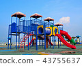 Colorful playground on blue sky background 43755637