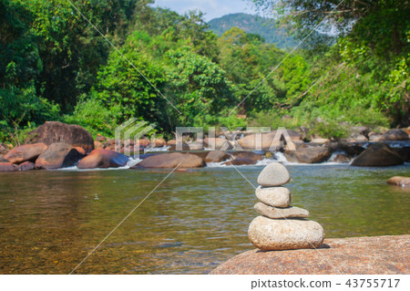 Pile of pebbles with beautiful landscape view. 43755717