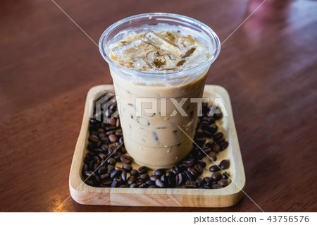 Cold coffee drink frappe or frappuccino in wooden  43756576