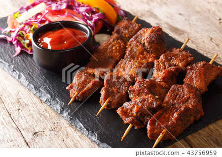 Recipe of a spicy African suya kebab on skewers 43756959