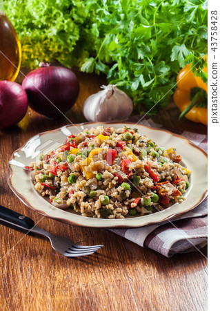 Bulgur salad with vegetables 43758428