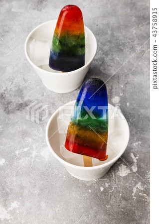 Rainbow colorful ice cream popsicle 43758915