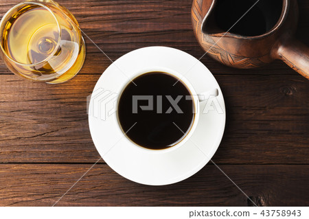 Coffee in white cup with cognac and clay cezve 43758943