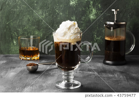 Irish coffee with whisky on dark background 43759477