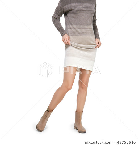 Female legs in boots with lifted skirt Female legs in boots with lifted skirt 43759610