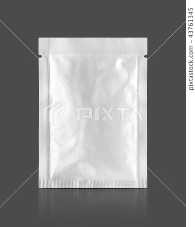 aluminum foil sachet isolated on gray background 43761345
