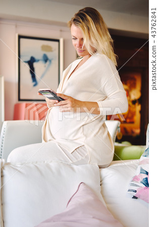 Pregnant woman at home 43762841