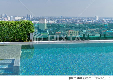 Swimming pool on roof top with beautiful city view at bangkok, t 43764002