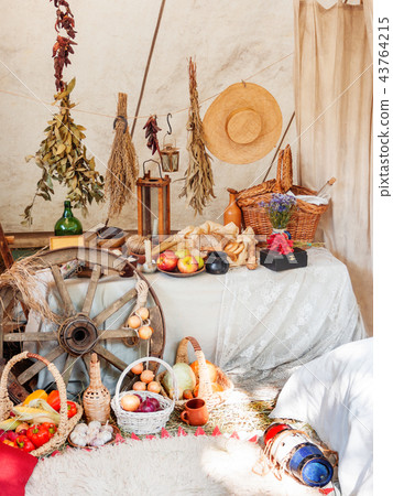 Old fashioned household items in markitant tent Old fashioned household items in markitant tent 43764215