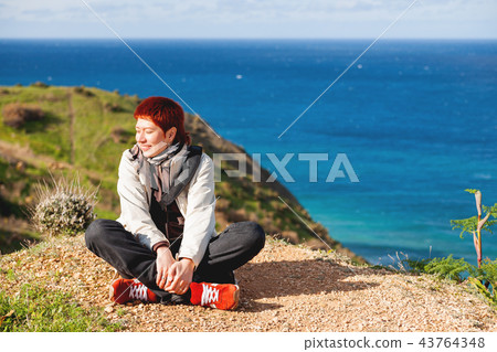 Happy wide smiling redhead women, Gozo, Malta. 43764348