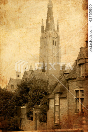 View at facade of old church in Bruges View at facade of old church in Bruges 43765990