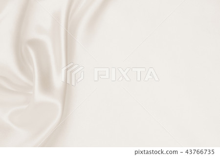 Smooth elegant golden silk or satin luxury cloth Smooth elegant golden silk or satin luxury cloth 43766735
