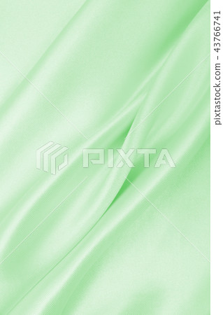 Smooth elegant green silk or satin luxury cloth Smooth elegant green silk or satin luxury cloth 43766741
