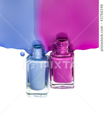 close up of nail polish flow on white background close up of nail polish flow on white background 43768346