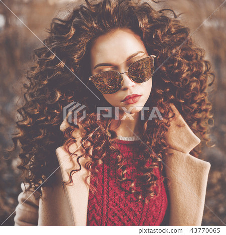 Fashion beautiful lady in autumn landscape 43770065