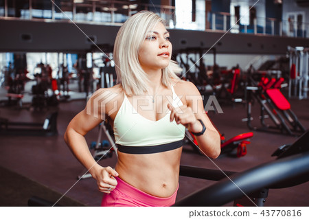 woman on the treadmill woman on the treadmill 43770816