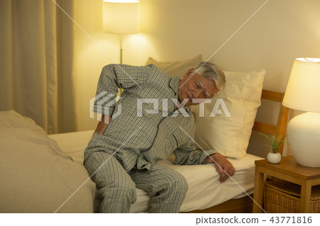 Senior male low back pain 43771816