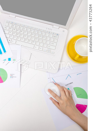 Modern office workplace with notebook, reports Modern office workplace with notebook, reports 43773264