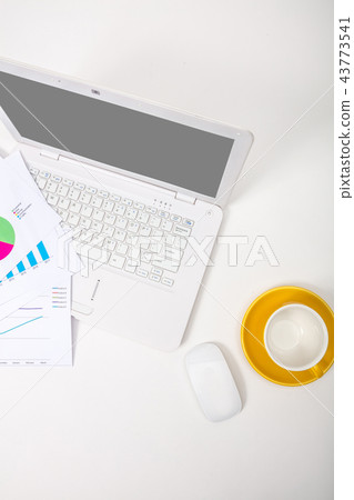 Modern office workplace with notebook, reports 43773541