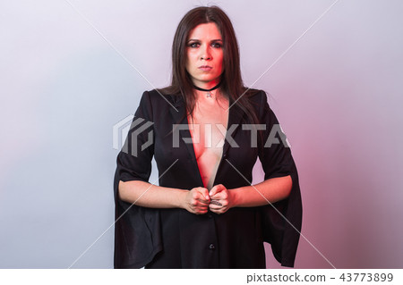 Fashion young woman going to Halloween party. Witch carnival costume. Portrait of sexy female in 43773899