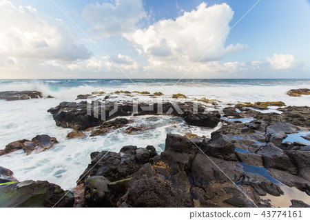 Beautiful Atlantic ocean coast with rocks and stones - Tenerife, Canary islands, Spain Beautiful Atlantic ocean coast with rocks and stones - Tenerife, Canary islands, Spain 43774161