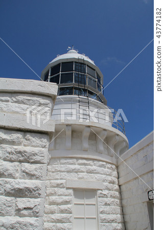 White lighthouse and blue sky White lighthouse and blue sky 43774182
