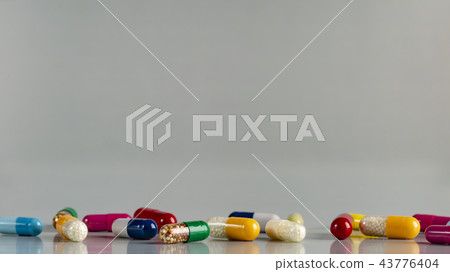 Different medicine capsules and pils 43776404