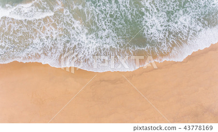 Aerial Father and son fishing in ocean surf 43778169