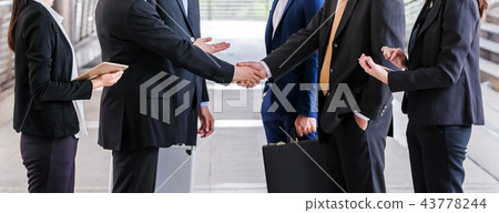 handshake of business People shaking hand in city 43778244