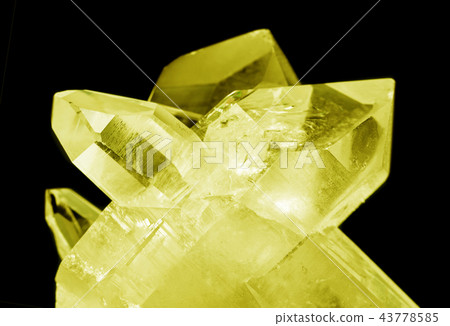 Yellow citrine crystals on black Yellow citrine crystals on black 43778585
