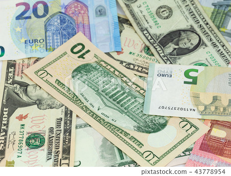 Dollar and euro banknotes background Dollar and euro banknotes background 43778954