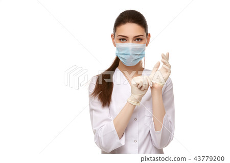 woman doctor in rubber gloves isolated on white 43779200