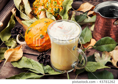 Pumpkin spice coffee with whipped cream Pumpkin spice coffee with whipped cream 43781262