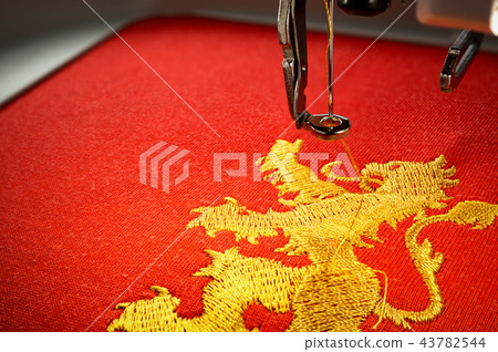 Close up image of embroidery machine and embroider 43782544