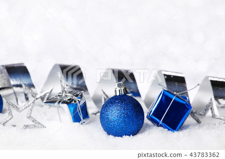 Christmas decorations on snow Christmas decorations on snow 43783362