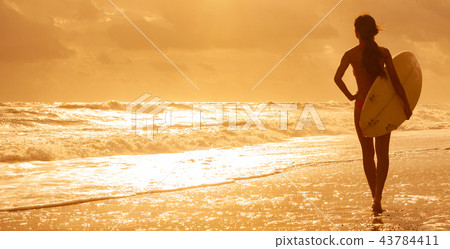 Woman Bikini Surfer & Surfboard Sunset Beach 43784411
