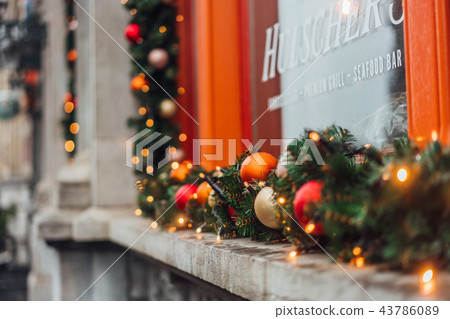 Christmas winter decorations on the window Christmas winter decorations on the window 43786089
