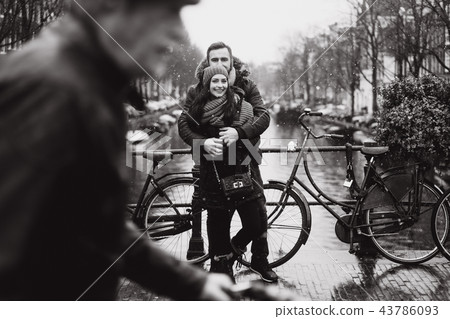 guy and girl in the street in the rain guy and girl in the street in the rain 43786093