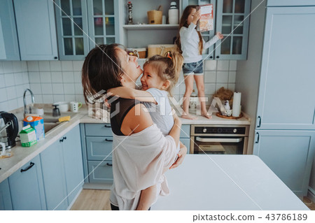 Happy family having fun in the kitchen 43786189