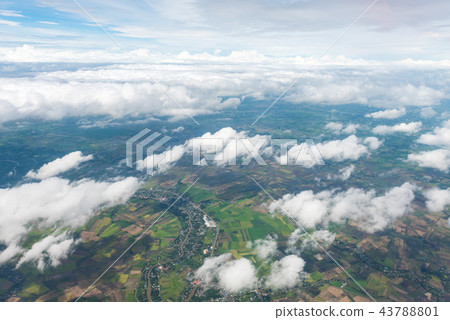 Aerial view of city through airplane window Aerial view of city through airplane window 43788801