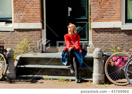 gin in sunglasses at Amsterdam, fall season gin in sunglasses at Amsterdam, fall season 43789968