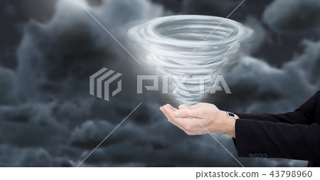 Tornado twister painted and dark sky with business hands cupped Tornado twister painted and dark sky with business hands cupped 43798960