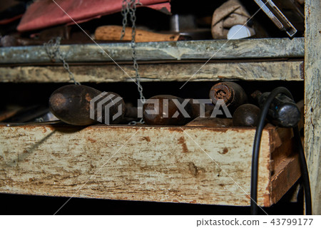 Old rusty tools on the garage rack Old rusty tools on the garage rack 43799177