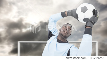 Soccer goalkeeper saving football in goal Soccer goalkeeper saving football in goal 43799255