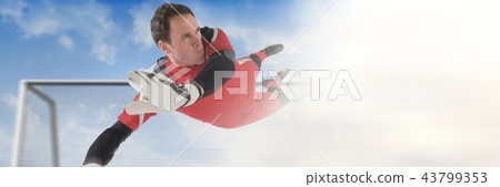Soccer goalkeeper saving in goal with transition 43799353