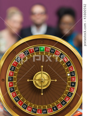 ROulette wheel and people in background 43800592