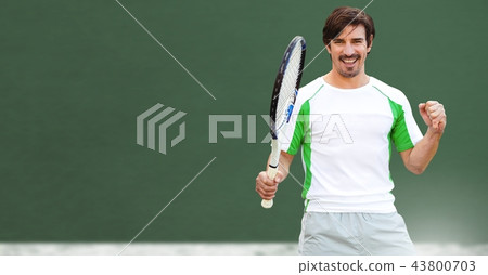 Tennis player man with green background with racket Tennis player man with green background with racket 43800703