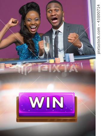 Win button and couple celebrating in casino Win button and couple celebrating in casino 43800714