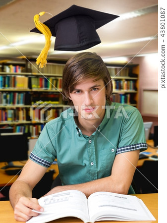 Student man in education library with graduation hat 43801087